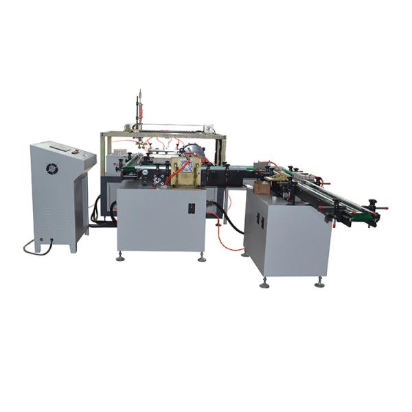 Machine de conditionnement automatique de rouleaux de papier pour caisse enregistreuse